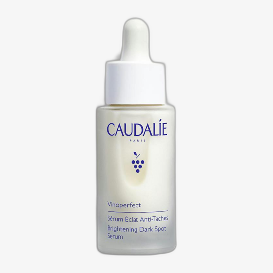 Флакон сыворотки Caudalie Vinoperfect для ухода за пигментными пятнами
