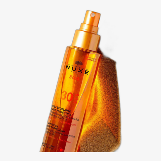 Nuxe Sun įdegio aliejaus SPF 10 pakuotė – saulės priežiūros priemonė