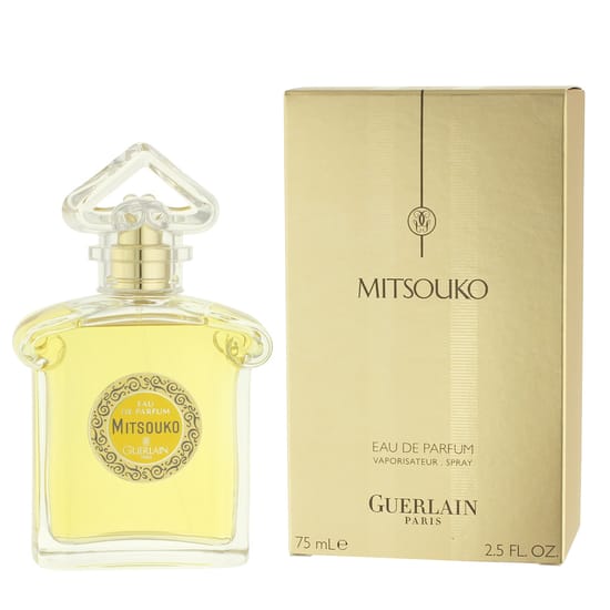 Guerlain Mitsouko EDP kvepalų flakonas su persikų ir jazminų natomis