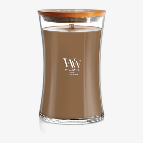 WoodWick Santal Myrrh scented candle in a large hourglass glass jar
