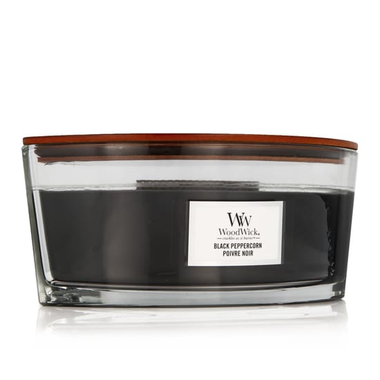 WoodWick Ellipse Black Peppercorn scented candle in its ellipse-shaped vessel