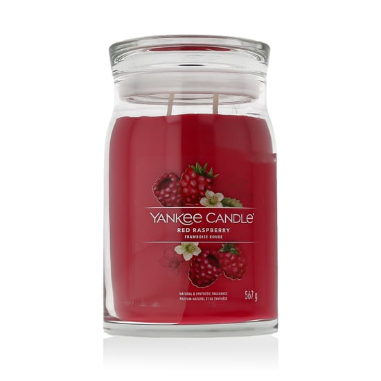 Yankee Candle Signature Red Raspberry scented candle shown in its jar